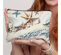1 , una bolsa de maquillaje con un tema oceánico que un diseño de y conchas. Esta bolsa de almacenamiento de artículos de tocador de viaje plegable es un regalo considerado para madres y cuidadores