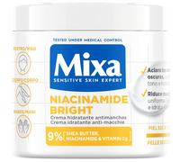 Mixa Crema Corporal Niacidamide Bright para pieles apagadas con 9% de [Manteca de karité + Niacinamida + Vitamina Cg]. Aclara las manchas oscuras. Apta para pieles sensibles. 400 ml.
