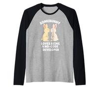 A Somebunny le Encanta ser un desarrollador sin código Lindo Conejito de Pascua Camiseta Manga Raglan