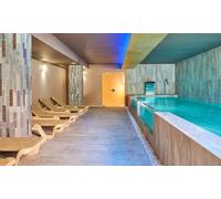 Acceso a piscina hidrotermal y masaje relajante de 25 minutos con copa de cava para 2 personas