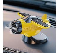Adorno de coche de hélice giratoria alimentada por energía solar, accesorio para tablero de instrumentos en forma de avión de combate, decoración interior de material ABS alimentado por luz (amarillo)
