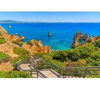 adrium Cuadro de aluminio compuesto de 140 x 90 cm: pasarela de madera a la hermosa playa Praia do Camilo en la costa de la región del Algarve, Portugal (73687668)