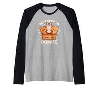 Arte Lindo de donación Recuerda donar Camiseta Manga Raglan