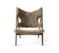 Audo Copenhagen Butaca Lounge Knitting Piel de oveja sahara. estructura de nogal