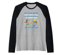 Autismo Mamá Estoy Elevando a Mi Héroe Concientización sobre el Autismo Camiseta Manga Raglan