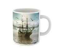 Awowee Taza de café con diseño de barco de vela de la naturaleza contra el hermoso paisaje del barco frío y oscuro amanecer, taza de té de cerámica de 325 ml, el mejor regalo o recuerdo para