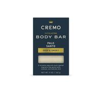Barra exfoliante corporal Cremo para hombre con aroma a palo santo. Fragancia multicapa que pule, limpia e hidrata la piel. 147 ml.