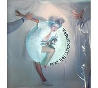 Beat The Clock 12" [Mottled blue vinyl] (UK 1979)