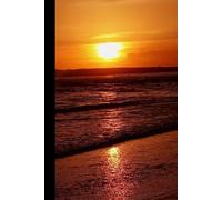 Beautiful notebook with a picture of the sunset on the beach.