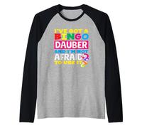 Bingo Dauber No tiene miedo Úselo Dicho divertido Camiseta Manga Raglan