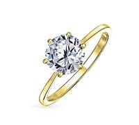 Bling Jewelry Anillo de compromiso solitario clásico redondo brillante de 1.5CT 6 garras AAA CZ para mujeres con banda delgada lisa de 1MM en plata de ley .925 chapada en oro amarillo de 14K.