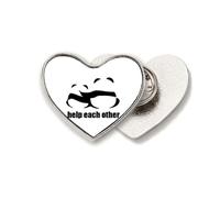 Broche de metal con diseño de pandas que se ayudan entre sí