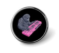 Broche de solapa con forma de Bigfoot tocando el piano eléctrico, insignia redonda de metal para chaqueta, sombrero, bolso, accesorios, joyería.