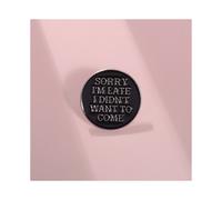 Broche negro creativo de dibujos animados con mensaje de disculpa: un complemento funcional y elegante para todos.