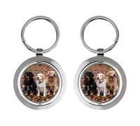 BYwenhopnbs Llavero giratorio de acero inoxidable con diseño de tres perros sentados entre las hojas.