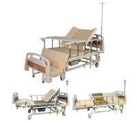 Cama médica elevable para pacientes paralizados, colchón antiescaras y mesa de comedor, cama de hospital de giro manual avanzado