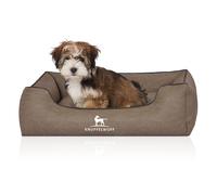 Cama para perros Knuffelwuff Scottsdale de cuero sintético M-L, 85 x 63 cm, piedra