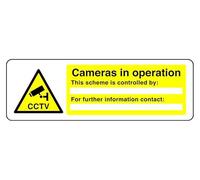 Cámaras en funcionamiento con texto en inglés «This Scheme Is Controlled By For Further Information Contact - Señal de seguridad - Adhesivo autoadhesivo de alta adherencia (600 mm x 200 mm) Distancia