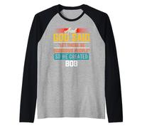 Camiseta con texto en inglés "And God Said So He Created BOB" Camiseta Manga Raglan