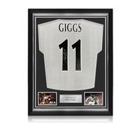 Camiseta de visitante del Manchester firmada por Ryan Giggs. Marco superior