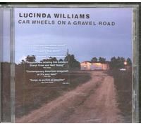 Car Wheels On A Gravel Road