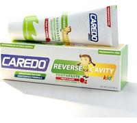 CAREDO Pasta de dientes para niños de 3 a 12 años - Protección de caries y fortalecimiento del esmalte dental con hidroxiapatita - Con xilitol y complejo vitamínico - Para dientes lácteos y