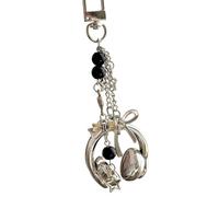 CAZSTYK Paquete de 1 llavero con forma de auriculares de música inspirado en la moda, accesorio para llaves, teléfono, bolso, decoración, hecho a mano, patrón de estrellas, plata, Talla única