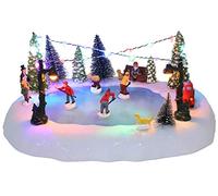Christmas Concepts® Escena animada de pueblo de pista de hielo con LED musical de 30 cm, funciona con pilas, reproduce 8 melodías navideñas