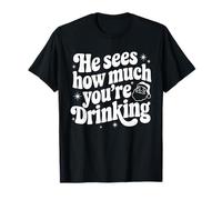 Cita sarcástica de Navidad He Sees How Much You'Re Drinking Camiseta
