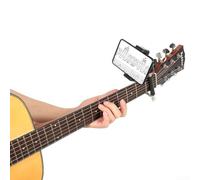 Clip para smartphone para guitarra que permite una integración práctica de herramientas digitales en el flujo de trabajo de aprendizaje de música tradicional