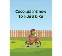 Coco learns how to ride a bike