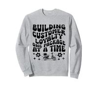 Construyendo la lealtad del cliente Un paquete a la vez Chico de entrega Sudadera