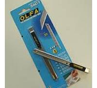 Cortador de metal Olfa para láminas y rótulos y adhesivos de pared.