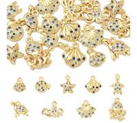Craftdady Colgantes de circonita cúbica, cangrejo, tortuga, estrella de mar, concha, océano, animales marinos, colgantes para hacer joyas, pulseras, collares, aretes, manualidades