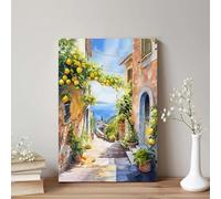 Cuadro acuarela que representa un callejón costero con vides de limoneros, impresión sobre lienzo (70x100cm/sin marco) con una maceta de terracota y una vista vintage del mar en una calle.