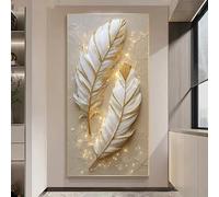 Cuadro decorativo de pared con láminas en lienzo que presentan una obra de arte con plumas doradas y luces centelleantes: una pintura de hojas brillantes sobre fondo blanco (60 x 120 cm).