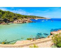 Cuadro en lienzo 80 x 50 cm: vista a la playa y al paseo marítimo de Cala Portinatx, isla de Ibiza, España (93345366)
