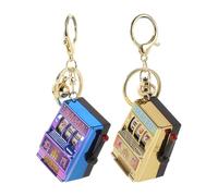 DECORNIJIA Llavero Mini Tragamonedas 2 Piezas, Colgante de Juguete Suerte, Mini Máquina Arcade Portátil en Colores Dorado y Púrpura para Fiestas, Regalos y Decoración de Cumpleaños