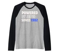 Desarrollado por Jesús Desde 1982 Cumpleaños de fe Cristiana Camiseta Manga Raglan