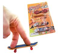 Description: 1. Perfect for practicing/mastering fingerboard tricks and | Mini finger skateboard with adjustment tool for practicing tricks, coordination and creative play.