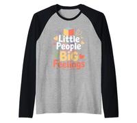 Disciplina positiva La inteligencia emocional los eleva suavemente Camiseta Manga Raglan
