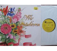 div. Künstler - Wir gratulieren / Bildhülle / Orchestrola # ORC 75.018 / Deutsche Pressung / 12" Vinyl Langspiel Schallplatte / Dominos / Orchester H.W. Kleve / Tölzer Knabenchor, Leitung Gerhard Schmidt-Gaden / Greta Keller / Camillo Felgen / Dhünntaler Musikanten / Gus Anton Chor / Mecky Schäning, C.F. Richards / Kerber Stubenmusik / Gitti und Erica / Wiener Promenadenorchester