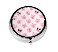 Divertida cara de cerdo rosa. Este pequeño pastillero redondo impreso es un organizador portátil de píldoras y vitaminas, perfecto para bolsillos, bolsos y viajes.