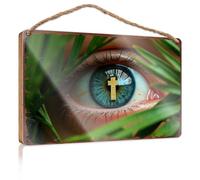 Divertida placa decorativa para colgar en la pared, cruz dorada que se refleja en un ojo azul entre hojas verdes, letrero de madera para decoración del hogar (15 x 28 cm)