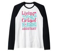 Divertido Auxiliar de Enfermería CNA Living The Scrub Life Camiseta Manga Raglan