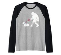 Divertido Sasquatch con Forma de Perro Corgi, Estilo Retro, paseando Camiseta Manga Raglan