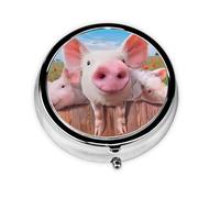 Divertido y lindo cerdo. Este pequeño pastillero redondo es un organizador portátil de medicamentos de viaje con tres compartimentos para almacenar medicamentos diarios.