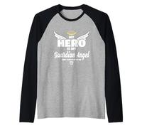 El héroe es mi ángel guardián en el Cielo. Me vigilan en Camiseta Manga Raglan