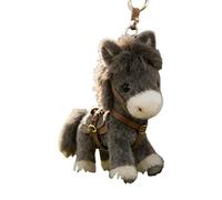 El pequeño caballo peludo es un llavero de caballo suave que muestra el diseño auspicioso para la cubierta del coche o la mochila escolar