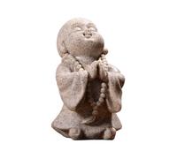 Elegante escultura de monje de resina se sienta en una figura budista para escritorio o mesa